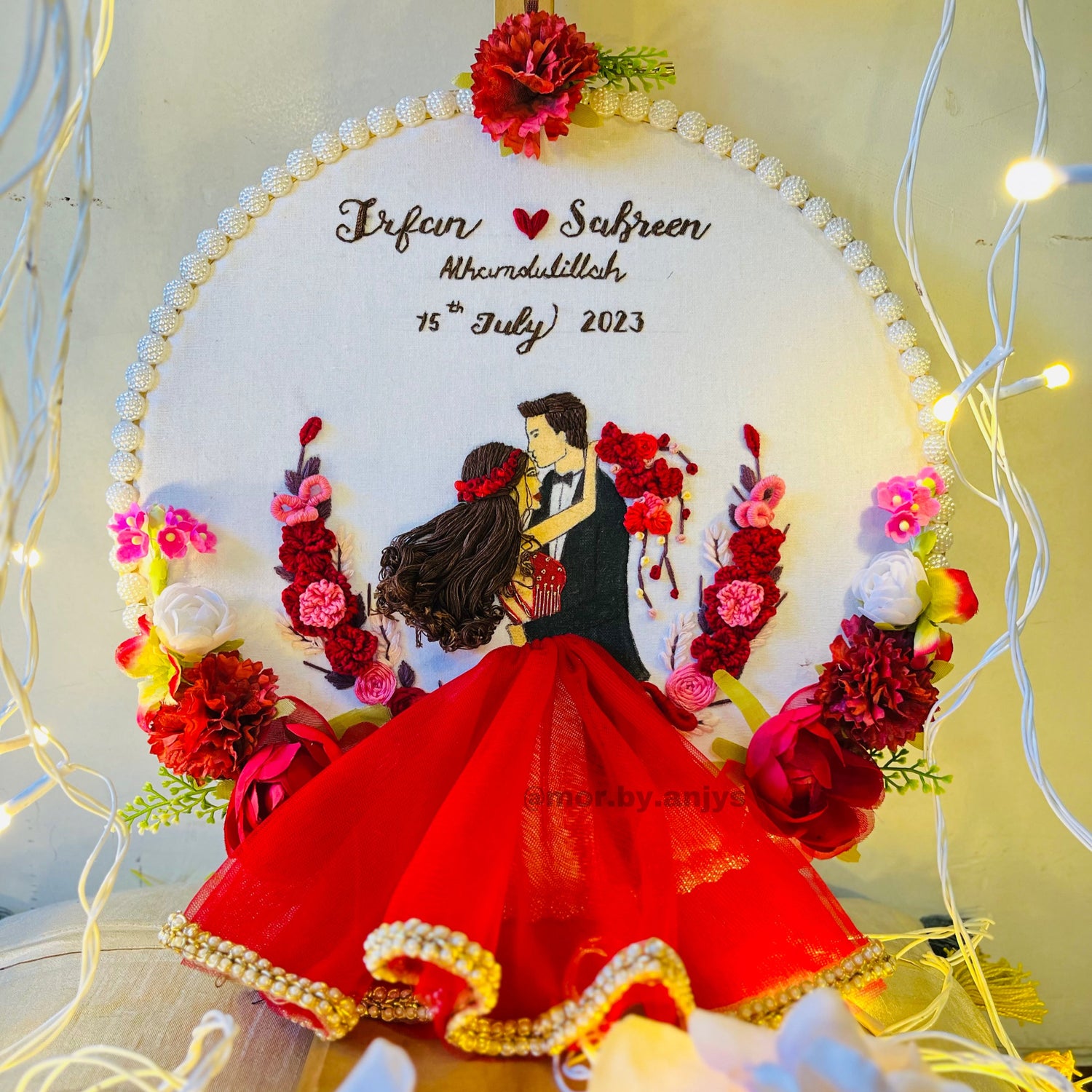 Decorative wall art with a couple in formal attire, surrounded by flowers perfect gift got engagement