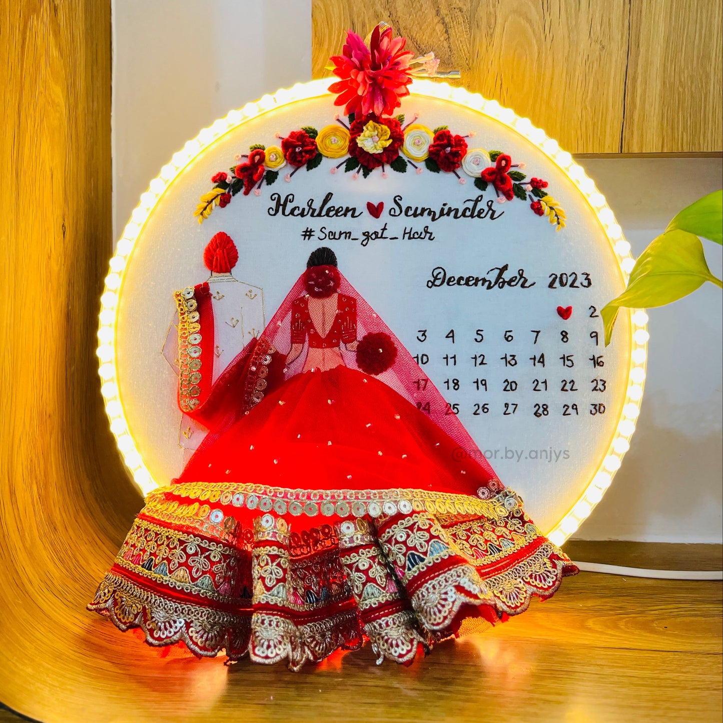 Decorative calendar with LED lighting on a wooden surface