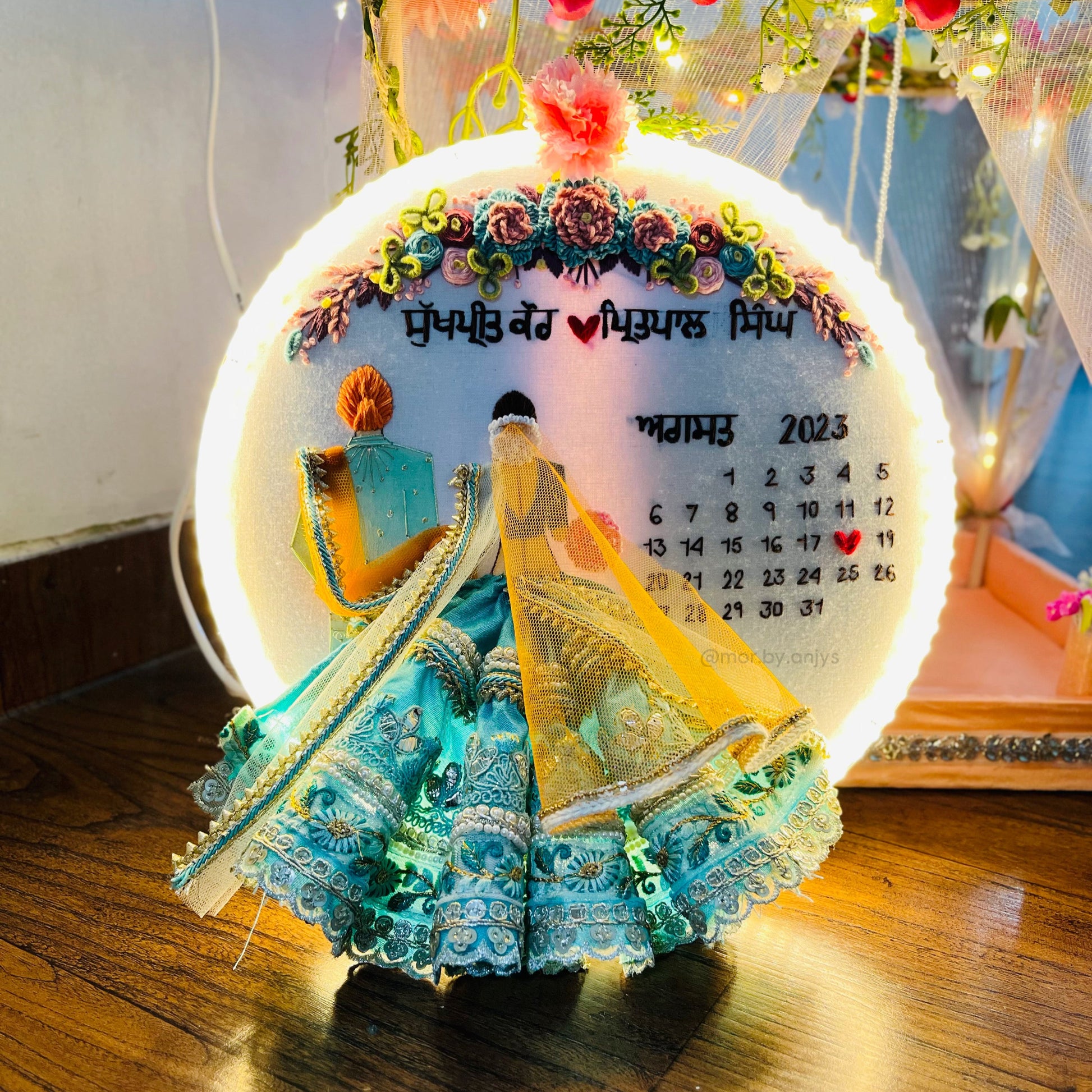 Decorative calendar with colorful design on a wooden surface